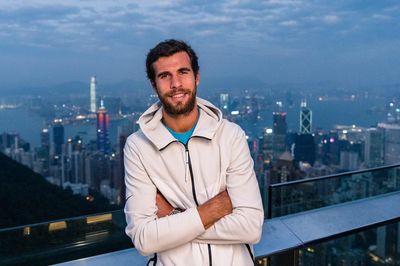 Karen Khachanov's Stylish White Jacket and Confident Pose in Instagram Photos