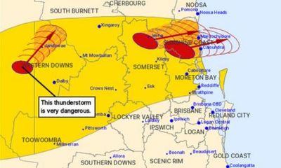 Queensland storms: two men in hospital after lightning strikes as hail and heavy rain hit south-east