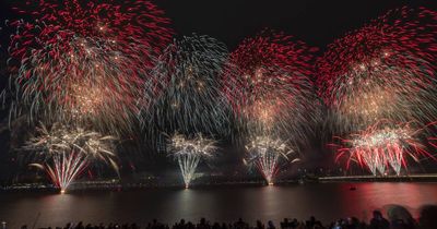 Families say goodbye to 'difficult' year with spectacular lakeside fireworks
