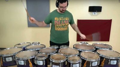 The man who holds the world record for most drumstick hits in one minute has now played the guitar solo from Lynyrd Skynyrd's Free Bird on a stand-up kit