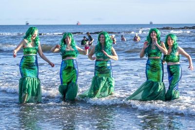 Swimmers across Scotland brave freezing waters for annual Loony Dook