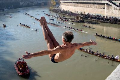 Watch: Italians dive into icy waters of Tiber River in Rome to celebrate New Year
