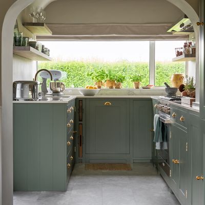 This stunning green kitchen is packed with genius small-space design ideas that can be reused in the future