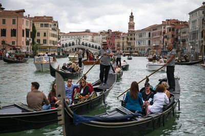 Venice will limit tour groups to 25 people and ban loudspeakers to control tourism