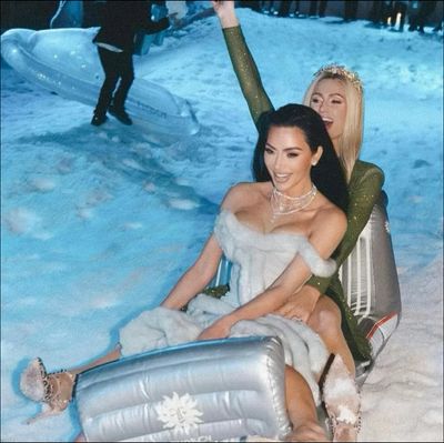 Paris Hilton and Kim Kardashian Shimmer in New Christmas Eve Photos