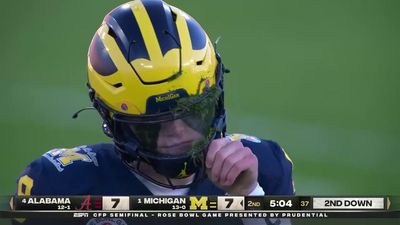 J.J. McCarthy got a facemask full of turf saving a broken trick play that set up a Michigan touchdown in the Rose Bowl