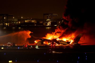 Japan Airlines plane bursts into flames on Tokyo runway after collision