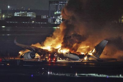 Inferno engulfs Tokyo runway as planes collide, passengers evacuated safely!
