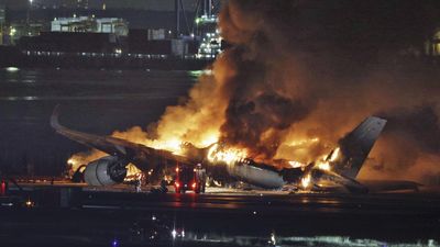 Planes collide and catch fire at Japan's busy Haneda airport, killing 5