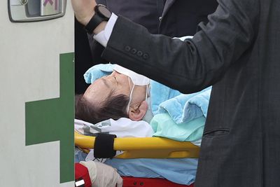 South Korean Opposition Leader Stabbed in Neck, Condition Stable