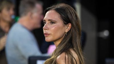 Victoria Beckham looks ultra elegant in a figure-hugging emerald green gown for final look of 2023