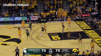 Caitlin Clark drained a buzzer-beater from the Iowa logo to defeat Michigan State, and fans were in awe