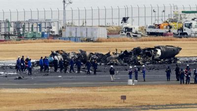 Japanese transport officials and police begin on-site probe after fatal crash on Tokyo runway
