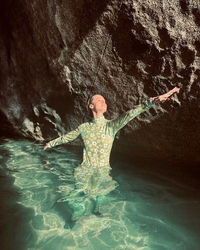 Brie Larson Embraces Nature's Beauty in Serene Water Pose