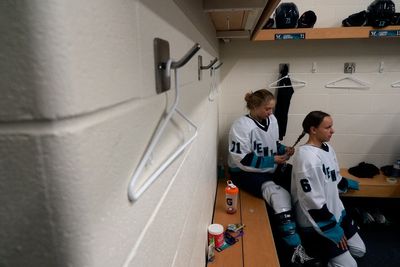 The AP goes behind the scenes at PWHL opener to capture 'the birth of women's hockey'
