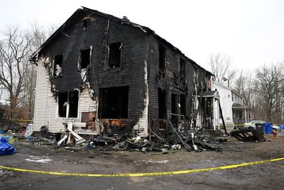 Four children killed as a fire tears through a multifamily home in Connecticut