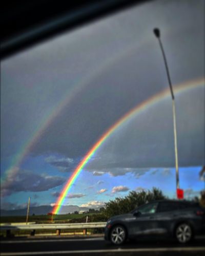 Capturing the Ethereal: A Radiant Double Rainbow in the Sky