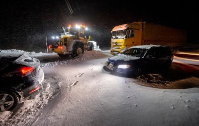 Extreme cold leaves thousands without power in Nordic countries while floods again hit Germany