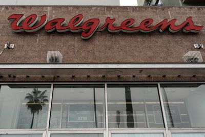 Drugstore chain Walgreens cuts quarterly dividend to get more cash to grow its business
