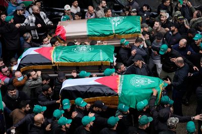 Thousands attend the funeral of a top Hamas official killed in an apparent Israeli strike in Beirut