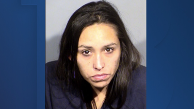 Woman arrested for robbing home of professor killed in UNLV shooting