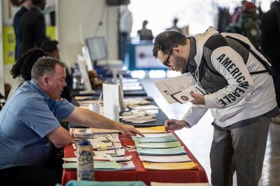 US adds 216,000 jobs in December as stronger than expected rise caps robust year