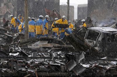 Western Japan earthquakes have claimed 100 lives; rain and snow imperil already shaky ground