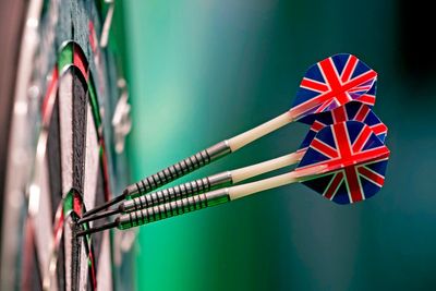 AP PHOTOS: Raucous British fans put on a show at the world darts championship