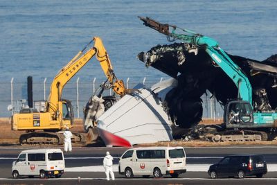 Watch: Crews continue clearing Japan Airlines wreck from Tokyo runway crash