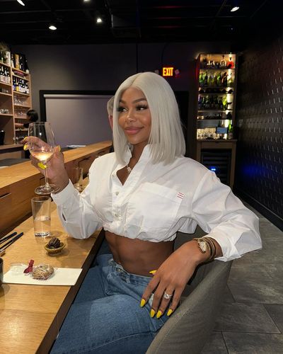 Jade Cargill: Effortlessly Stylish in Classic White Shirt and Jeans