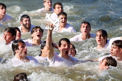 Florida's Greek community celebrates the Epiphany with annual dive into water to retrieve cross