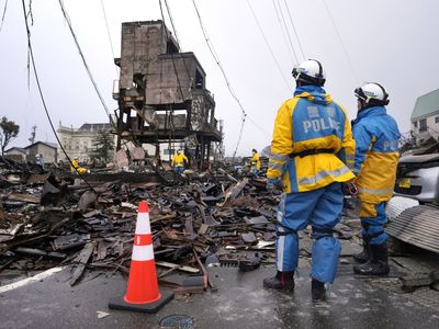 Snow hinders rescues and aid to isolated communities after Japan quakes kill 128