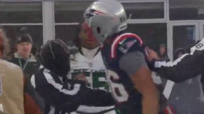 Patriots TE Ripped Jets Defender’s Helmet Off During Heated Moment on Sideline