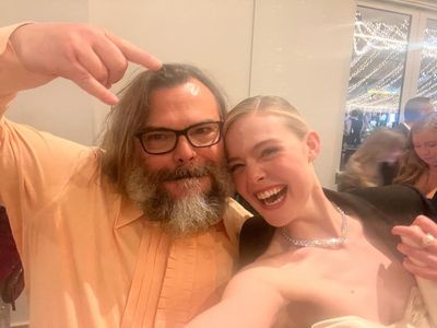 Radiant Joy: Elle Fanning and Friend Painting Smiles Together