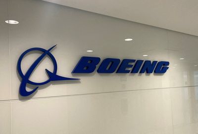 Boeing's Plunge Pulls Dow Down; Nasdaq Boosted by Megacaps