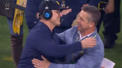 Jim Harbaugh Surprised by Brother John on Michigan Sideline During CFP Title Game