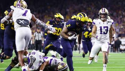Michigan rolls past Washington to win first national title since 1997