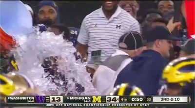 Jim Harbaugh Expertly Dodged His Gatorade Bath As Michigan Won the National Championship