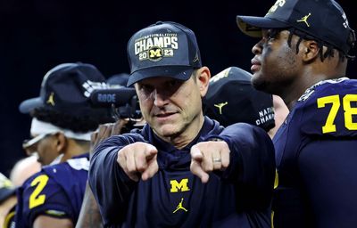 12 epic photos of Michigan football celebrating its first national title since 1997