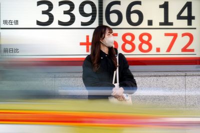 Stock market today: Asian shares advance following Wall Street rally led by technology stocks