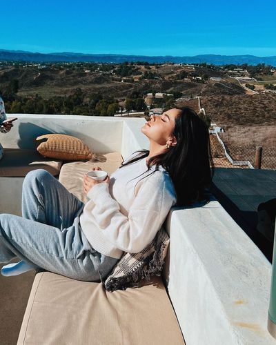 Becky G's Cozy Winter Coffee Moment: Basking in Winter Sun!