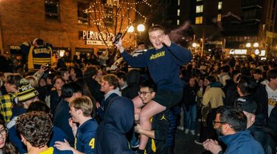 Delirious Michigan Fans Take Over Streets of Ann Arbor to Celebrate National Title