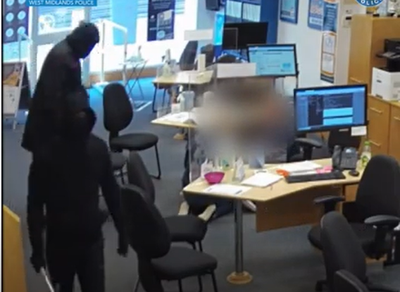 Moment violent masked gang storm travel agent armed with hammers, axe and knives