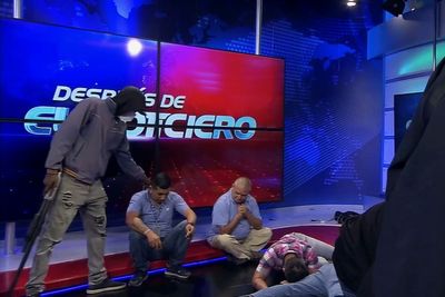 "We are on air!" Masked gunmen storm TV studio in Ecuador as gang attacks in the country escalate