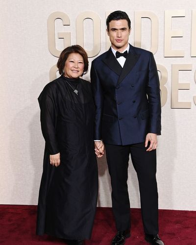 Charles Melton and his radiant mother at the Golden Globe Awards