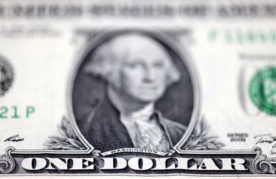 Dollar Dips, Bitcoin Slides Ahead of US Inflation Data