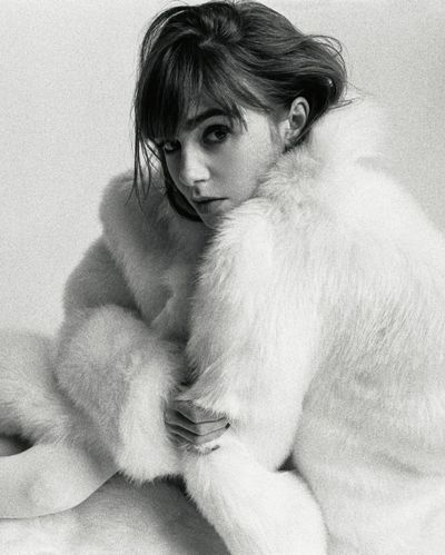 Lily Collins Embraces Winter Glamour in Luxurious Furry Coat