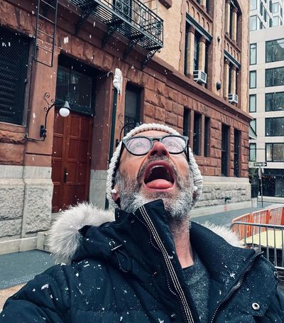 The Enchantment of Snowfall: Hugh Jackman Embracing Winter Magic