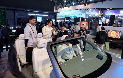 Legacy automakers race to catch up in AI at CES
