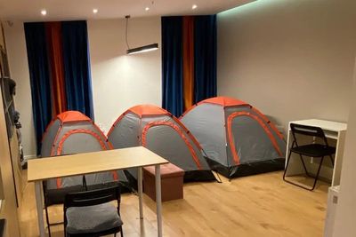 Airbnb owner lists tents in living room for London tourists – and charges £68 a night